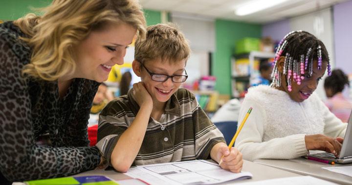 Teacher With Young Student